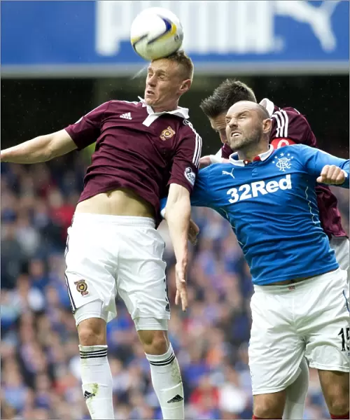 Rangers vs Hearts: Clash at Ibrox - The Epic Showdown Between Kris Boyd and Kevin McHattie in the 2003 Scottish Cup
