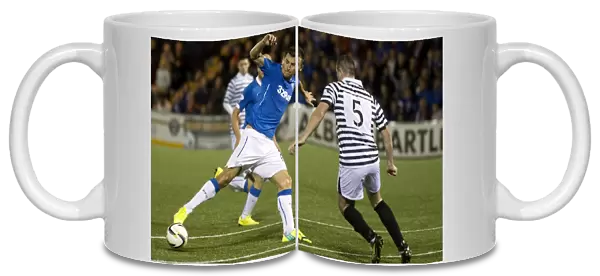 Battle for the Ball: McCulloch vs. Quinn - Scottish League Cup Showdown (2003)