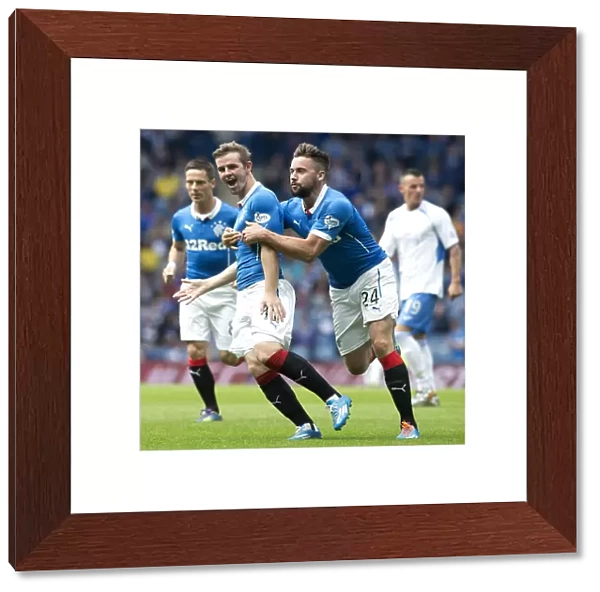 Rangers Football Club: Templeton and McGregor's Jubilant Moment after Goal at Ibrox Stadium - SPFL Championship: Rangers vs Queen of the South