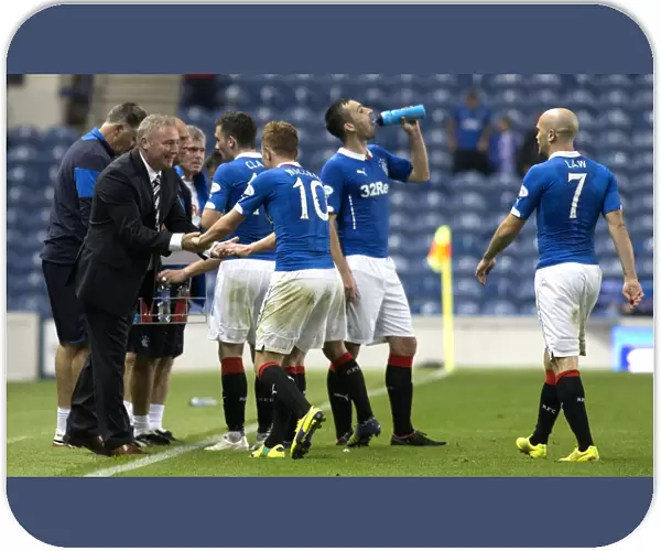 Rangers: McCoist and Macleod Celebrate Goal in Scottish League Cup Victory at Ibrox