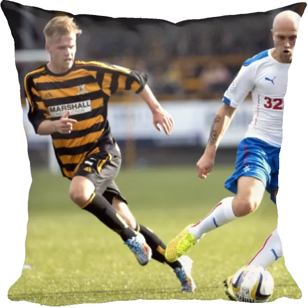 Rangers Nicky Law Shields Ball from Alloa Athletic: SPFL Championship Clash