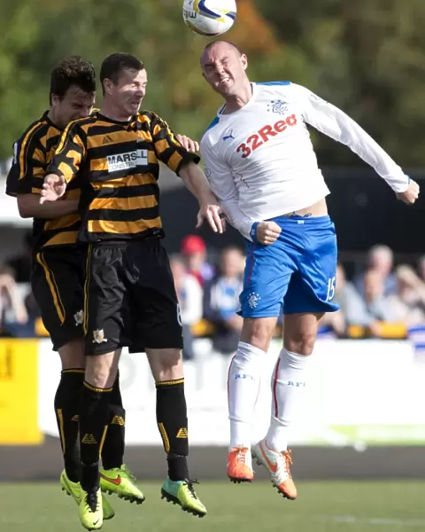 Rangers Kris Boyd Fights for a Header Against Alloa Athletic in the SPFL Championship