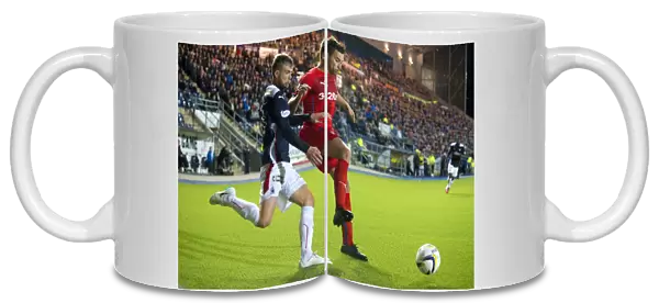 Intense Clash: Darren McGregor vs Rory Loy in Rangers vs Falkirk Scottish League Cup Match