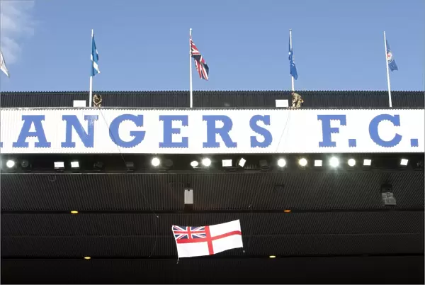 Scottish Cup Victory: Royal Marines Honor Rangers Football Club with Flag Raising at Ibrox Stadium