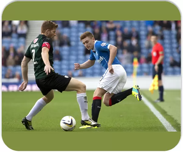 Rangers vs Raith Rovers: A Fierce Championship Clash at Ibrox Stadium - Macleod vs Thomson's Intense Battle for Ball Supremacy