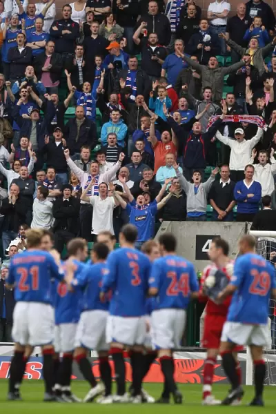 Thrilled Rangers FC Fans Erupt in Cheers at Easter Road during Hibernian vs Rangers - Clydesdale Bank Premier League Match