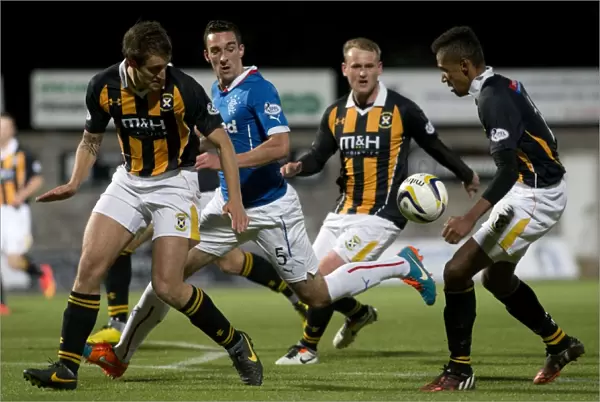 Rangers vs East Fife: Lee Wallace's Intense Battle for the Ball in Petrofac Training Cup Quarterfinal at Bayview Stadium