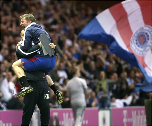Rangers Take the Lead: McCoist and McDowall's Exuberant Celebration at Ibrox
