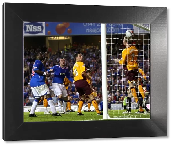 Barry Ferguson Scores the Game-Winning Goal Past Motherwell's Stephen Hughes at Ibrox: Rangers Take the Lead (1-0)