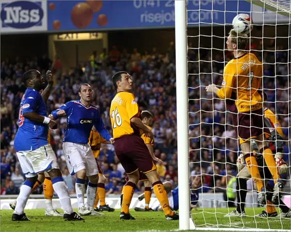 Barry Ferguson Scores the Game-Winning Goal Past Motherwell's Stephen Hughes at Ibrox: Rangers Take the Lead (1-0)
