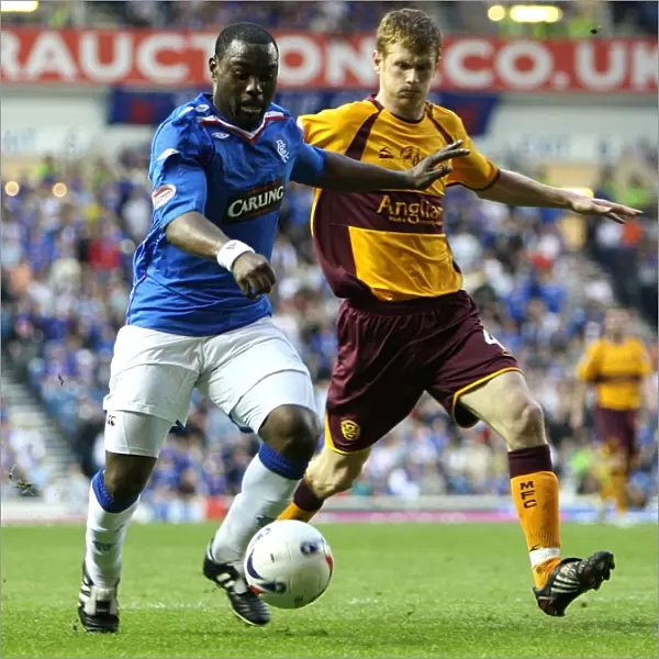 Intense Battle for Supremacy: Darcheville vs Reynolds at Ibrox - Rangers 1-0 Motherwell