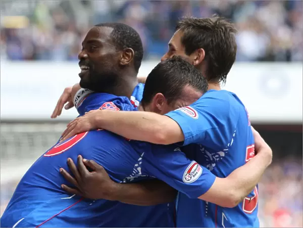 Rangers Glory: Darcheville, Ferguson, and Furman's Jubilant Reaction to Scoring the Third Goal vs. Dundee United (3-1)