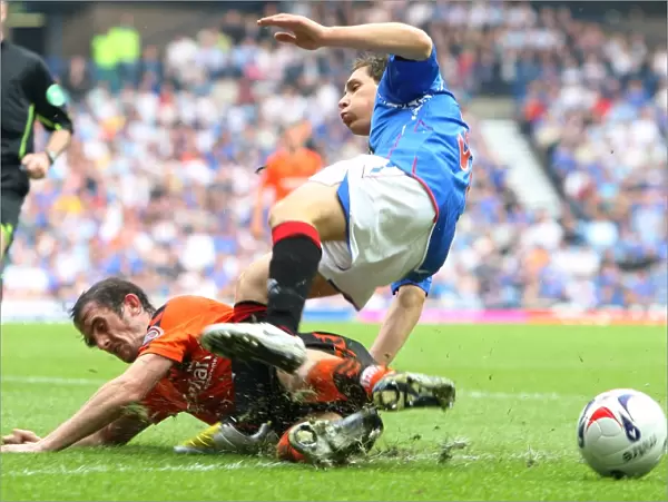 Rangers Triumph over Dundee United: Dean Furman vs Mark Kerr at Ibrox - 3-1 Victory in the Clydesdale Bank Premier League