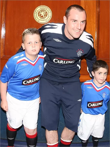Rangers FC's Triumphant Mascot: Celebrating a Glorious 3-1 Victory over Dundee United