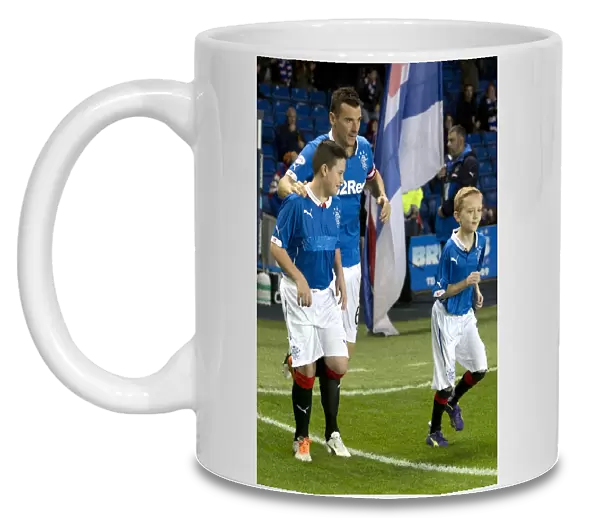 Rangers Football Club: Quarter Final Triumph - Scottish League Cup: Rangers vs St Johnstone at Ibrox Stadium - Celebrating Glory with Captain Lee McCulloch and Mascots (2003)