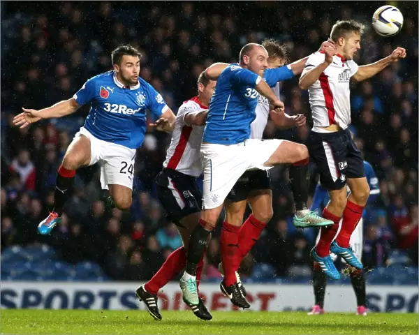 Rangers FC vs Falkirk: Kirs Boyd's Determined Battle for the Ball - Scottish Championship Scottish Cup Winning Moment