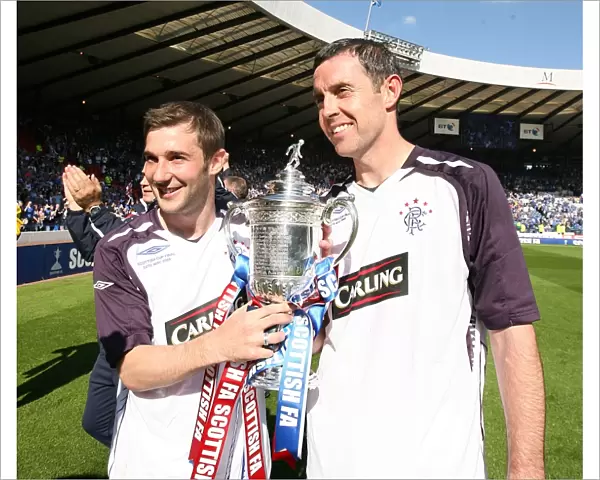 Scottish Cup Victory 2008: Thomson and Weir Celebrate with the Trophy
