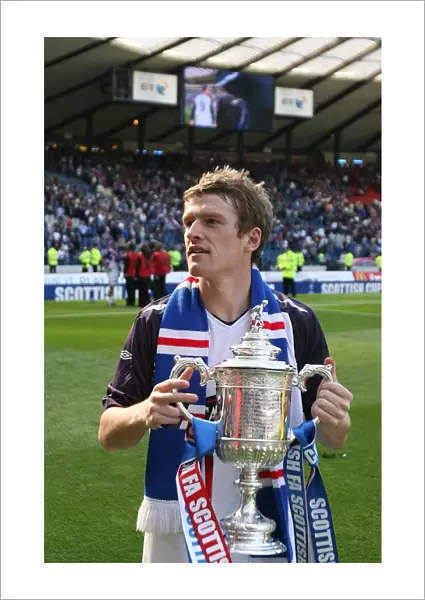Rangers Football Club: Steven Davis Celebrates Scottish Cup Victory (2008) - Triumphing with the Trophy at Hampden Park