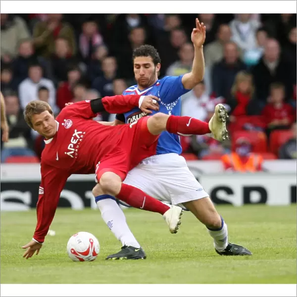 Cuellar vs Millar: Aberdeen's Triumph over Rangers in the Clydesdale Bank Premier League (2-0)