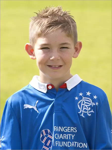 Rangers U12: Celebrating Scottish Cup Victory with Coach Robbie Fraser at Murray Park