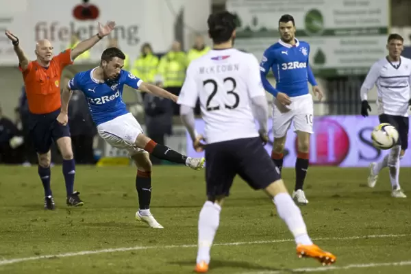 Rangers Nicky Clark Unleashes Shot: Scottish Championship Showdown vs Raith Rovers at Starks Park