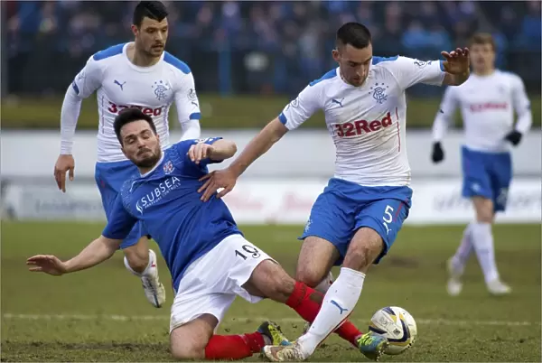 Rangers vs Cowdenbeath: Lee Wallace vs Sean Higgins - Intense Moment in the Scottish Championship Match at Central Park