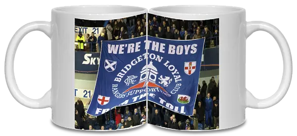 Triumphant Rangers Fans Hoist Scottish Cup Victory Banner at Ibrox Stadium (2003)