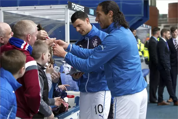 Scottish Cup Victory: Rangers Bilel Mohsni and Haris Vuckic Celebrate with Fans at Ibrox Stadium