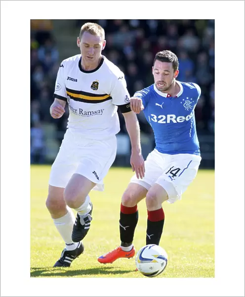 Rangers vs Dumbarton: A Clash Between Nicky Clark and Andy Graham in the Scottish Championship