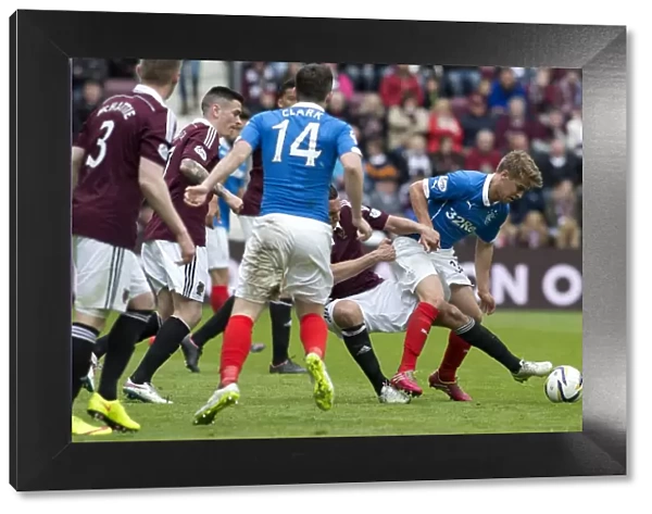 Intense Rivalry: Andy Murdoch's Battle for the Ball at Tynecastle Stadium - Rangers vs Heart of Midlothian (Scottish Championship)
