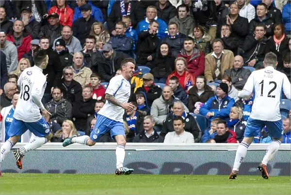 Euphoric Moment: Derek Lyle's Goal Celebration in Rangers Scottish Premiership Play-Off Victory over Queen of the South at Ibrox Stadium