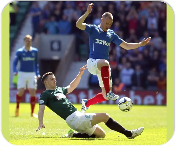 Rangers Kenny Miller: Evading Hibernian Defenders in the Scottish Premiership Play-Off Semi-Final