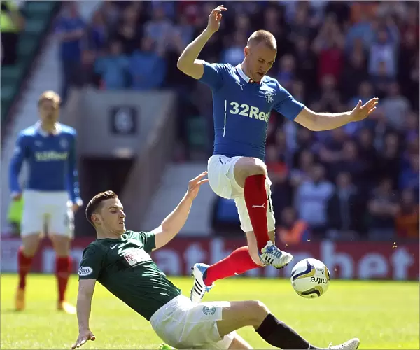 Rangers Kenny Miller: Evading Hibernian Defenders in the Scottish Premiership Play-Off Semi-Final