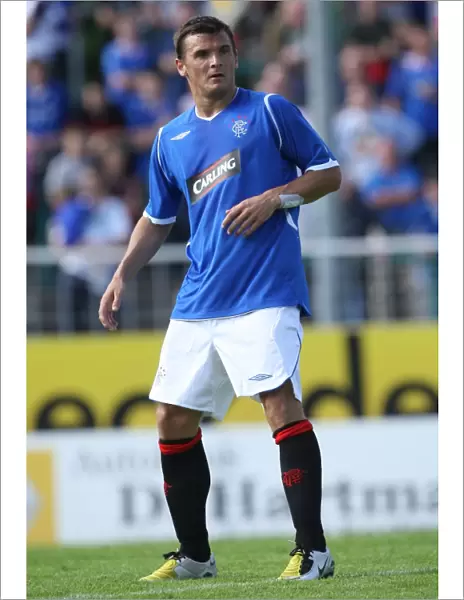 Lee McCulloch Scores the Winning Goal: Rangers FC Triumphs Over SC Preussen Münster (1-0)