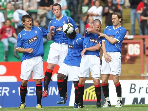 Rangers FC's Pre-Season Triumph: McCulloch, Adam, Darcheville, Miller, and Papac Shine in 1-0 Victory over SC Preussen Münster