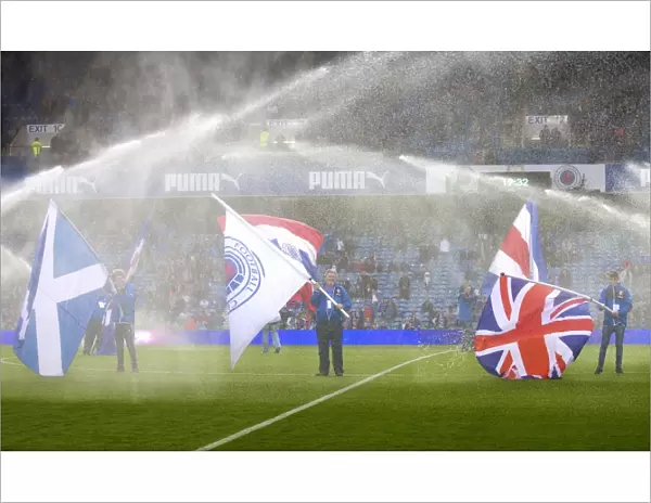 Rangers Football Club: Pre-Season Friendly - Flag Bearers Drenched by Ibrox Stadium's Sprinklers