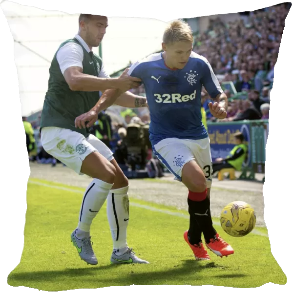 Clash of the Titans: Waghorn vs Forster in the Petrofac Training Cup Showdown between Hibernian and Rangers
