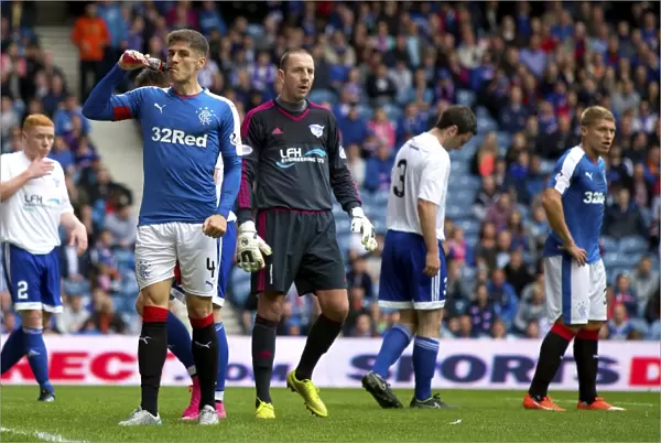 Rangers Rob Kiernan Relaxes with a Drink Amidst League Cup Action at Ibrox Stadium