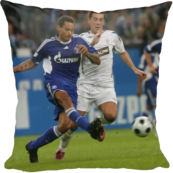 Thrilling Pre-Season Clash: Rangers vs. Schalke 04 - Battle of Thomson and Jones at Veltins Arena (1-0 in Favor of Schalke)