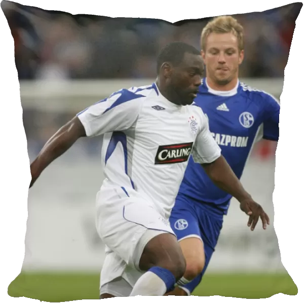 Darcheville Scores the Opener: Schalke 04 Leads Rangers 1-0 in Pre-Season Clash at Veltins Arena