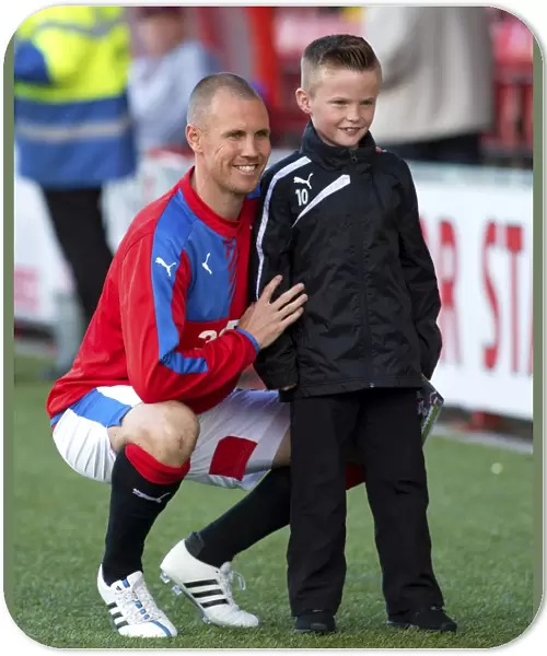 Rangers Kenny Miller Delights Young Fan at Airdrieonians Excelsior Stadium during League Cup Match