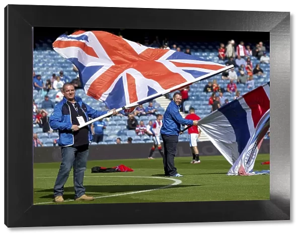 Glasgow's Pride: Rangers Flag Bearers Celebrate Scottish Cup Victory at Ibrox Stadium (2003)