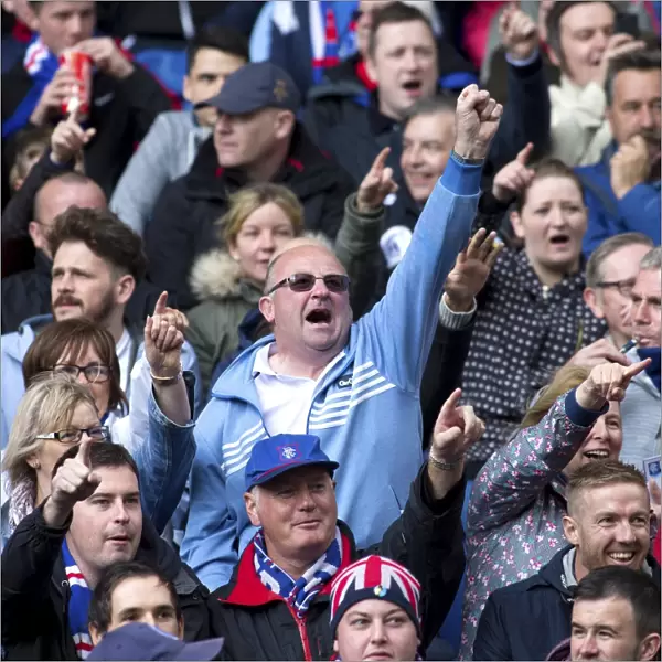 Euphoric Rangers Fans: Celebrating Championship Victory at Ibrox Stadium