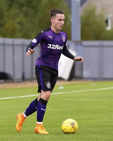 Rangers Barrie McKay in Action: Ladbrokes Championship Clash at Dumbarton's The Cheaper Insurance Direct Stadium