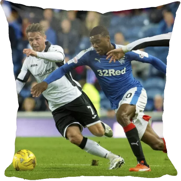 Intense Rivalry: Nathan Oduwa's Battle for the Ball in Rangers vs St. Johnstone Scottish League Cup Clash at Ibrox Stadium