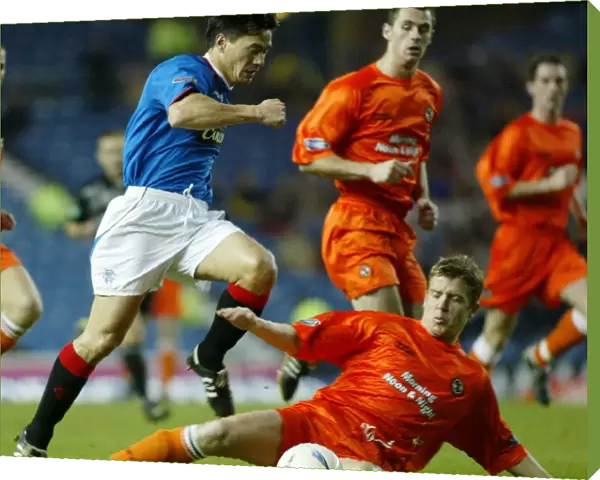 Rangers Secure Hard-Fought 2-1 Victory Over Dundee United (06 / 12 / 03)
