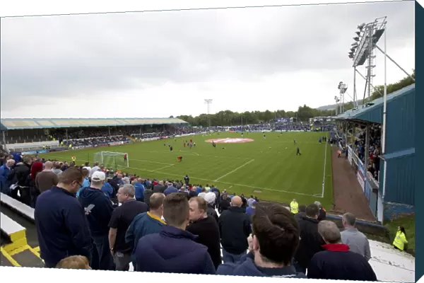 Rangers Fans Celebrate Championship Victory at Cappielow Park