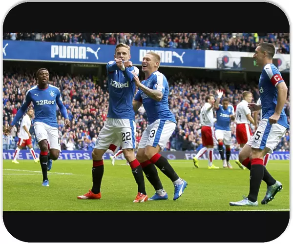 Dean Shiels Euphoric Moment: Rangers Football Club Celebrates Championship Glory at Ibrox Stadium