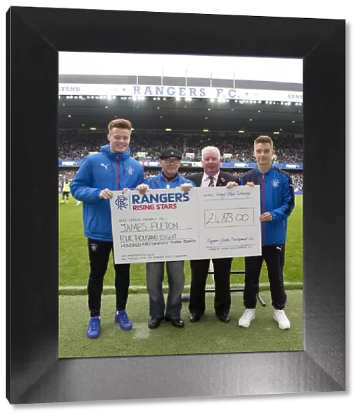 Rangers Football Club: Alex MacDonald and Rising Star Draw Winner Celebrate Victory at Ibrox Stadium