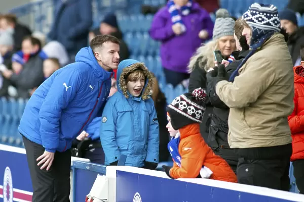 Rangers Football Club: Andy Halliday Greets Ecstatic Fans at Ibrox Stadium during Rangers vs Falkirk in Ladbrokes Championship